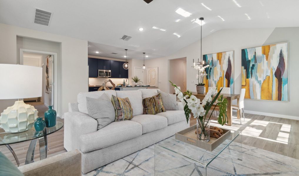 Open main living area with wood-look tile flooring