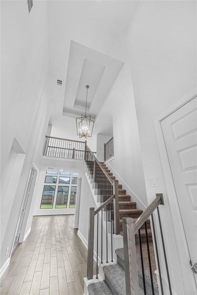 Furnished interior view inside a new home in Sunterra, Katy (Image 4).
