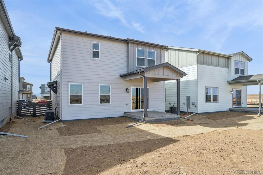 Exterior details and patio area of a home in Legato, Commerce City (Image 18).