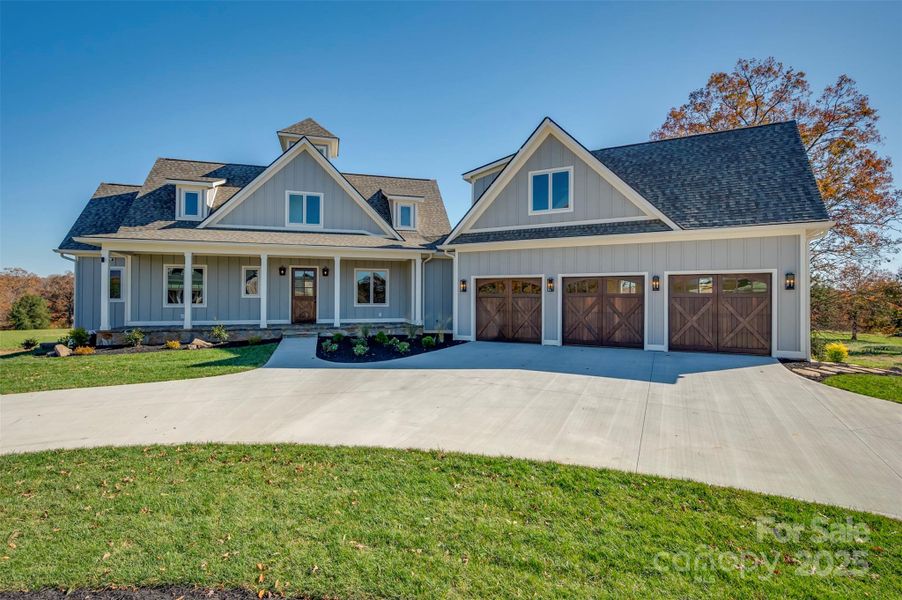 Front exterior of a new home in , Tryon, NC, highlighting curb appeal (Image 2).