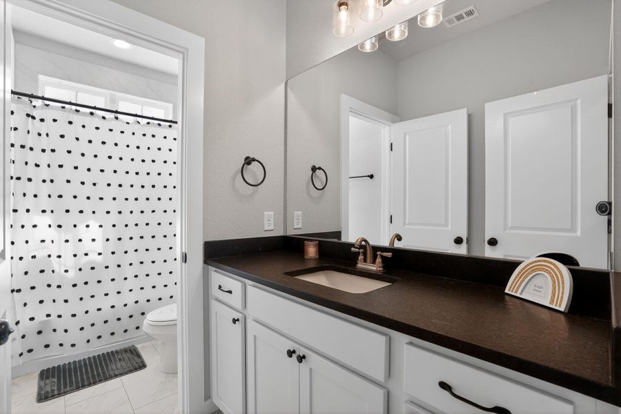 Furnished interior view inside a new home in , College Station (Image 12).