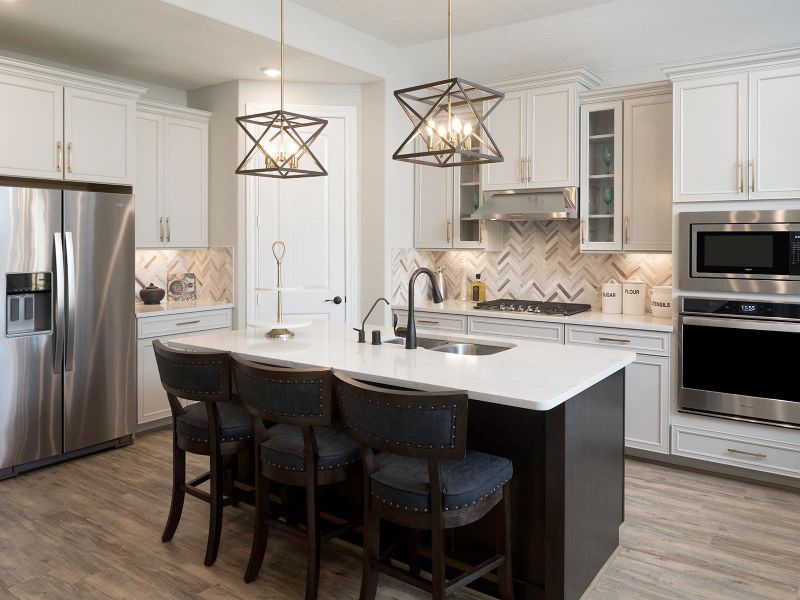 Photo is not of the actual home, but is an inspirational photo of builder’s model home and may depict options, furnishings, and/or decorator features that are not included