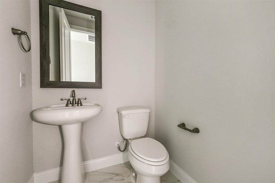 Furnished interior view inside a new home in Evergreen 55', Conroe (Image 14).