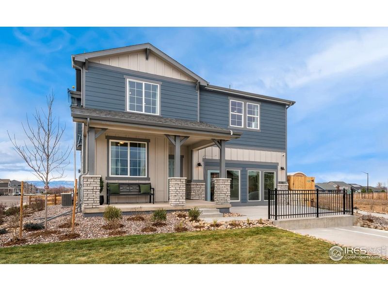 Front exterior of a new home in Hidden Creek, Frederick, CO, highlighting curb appeal (Image 1). Front exterior of a new home in Hidden Creek, Frederick, CO, highlighting curb appeal (Image 1).
