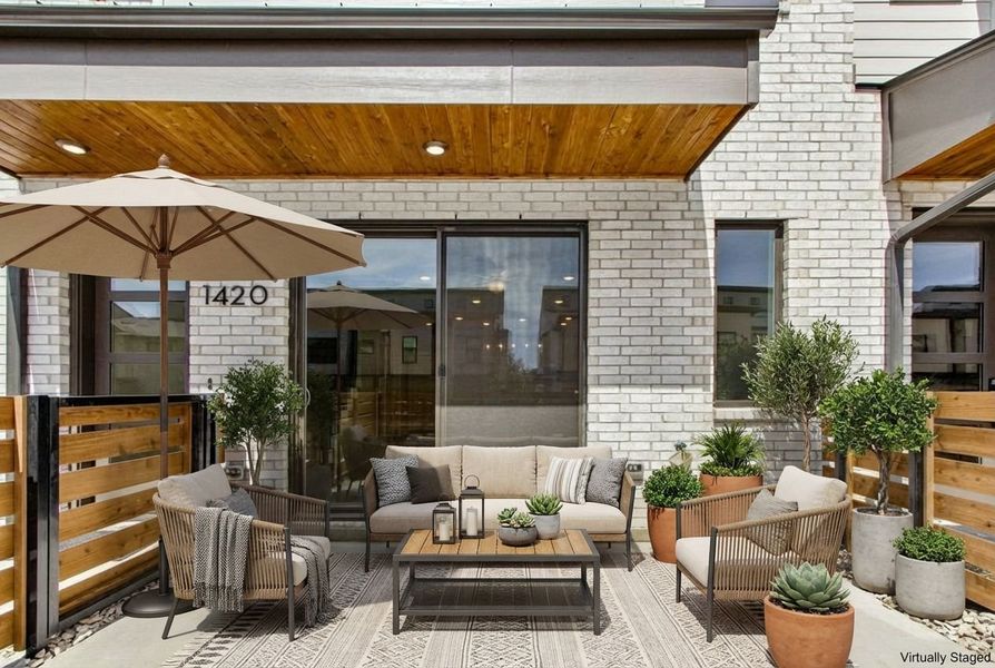 Exterior details and patio area of a home in Willow Grove Townhomes, Melissa (Image 4).