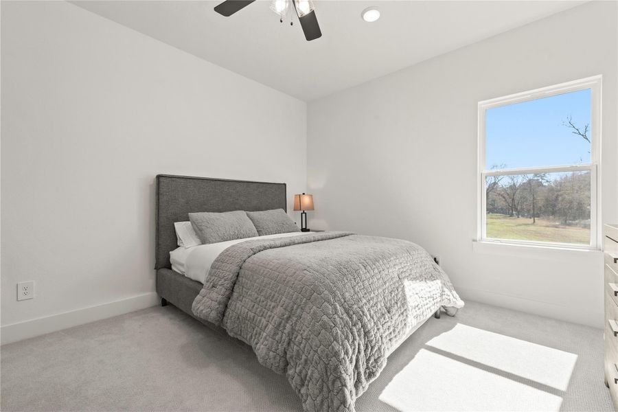 Bedroom #4 located on second level, private vanity connected to jack & Jill bath