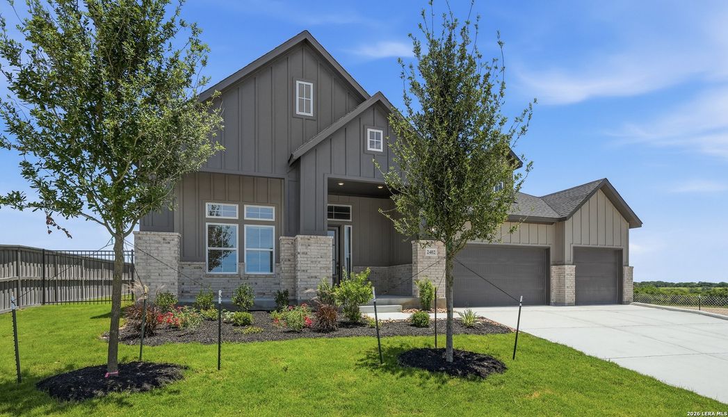 Front exterior of a new home in Prominence Urban, San Antonio, TX, highlighting curb appeal (Image 1). Front exterior of a new home in Prominence Urban, San Antonio, TX, highlighting curb appeal (Image 1).