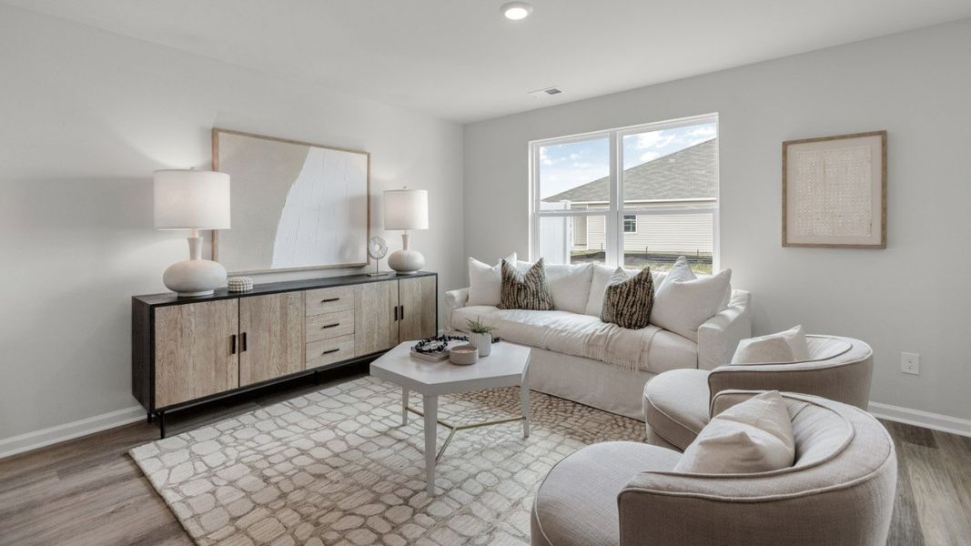 Representative furnished interior of a home built from the PEARSON TH by D.R. Horton in The Cove at Glenns Bay, Surfside Beach (Image 8).