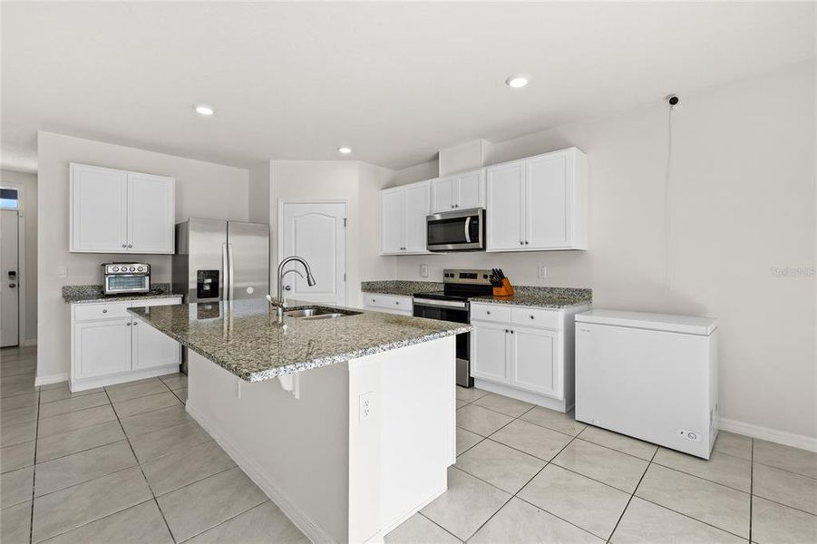 Furnished interior view inside a new home in Eden Hills, Lake Alfred (Image 10).