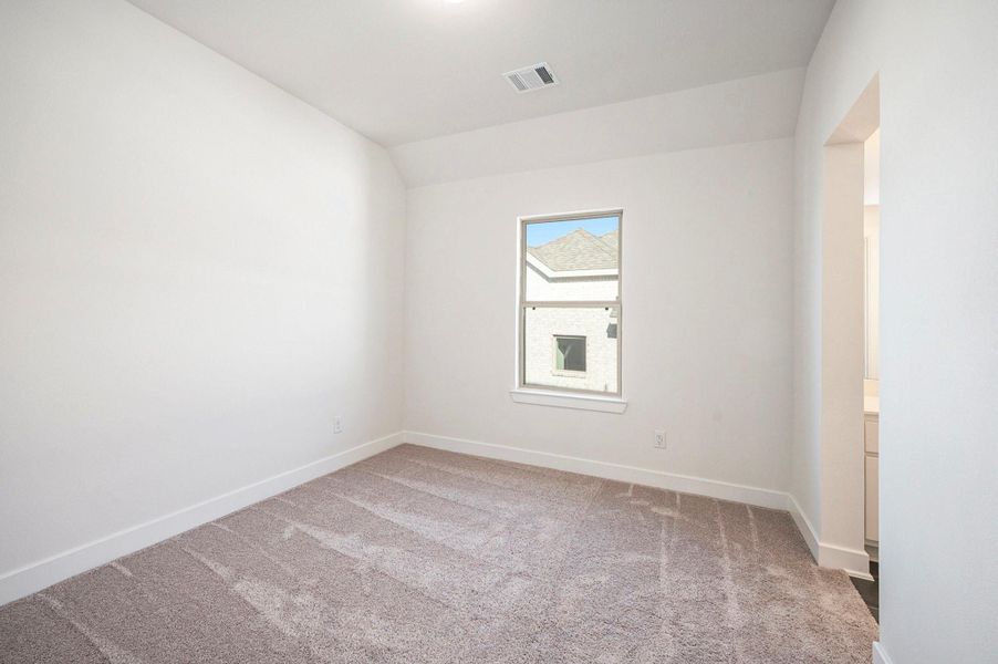 This sizable secondary bedroom offers plenty of space and comfort, featuring ample natural light and a versatile layout. Perfect for guests, family members, ,it provides a peaceful retreat with elegant design and thoughtful details throughout.