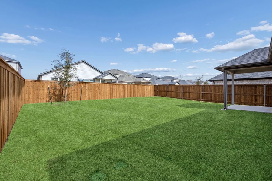 Covered Patio in the Masters home plan by Trophy Signature Homes – REPRESENTATIVE PHOTO