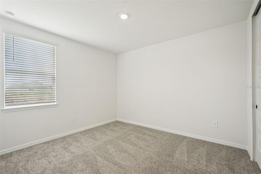 Spacious, unfurnished interior of a new home in Oakfield Trails - Signature Series, Parrish (Image 34).