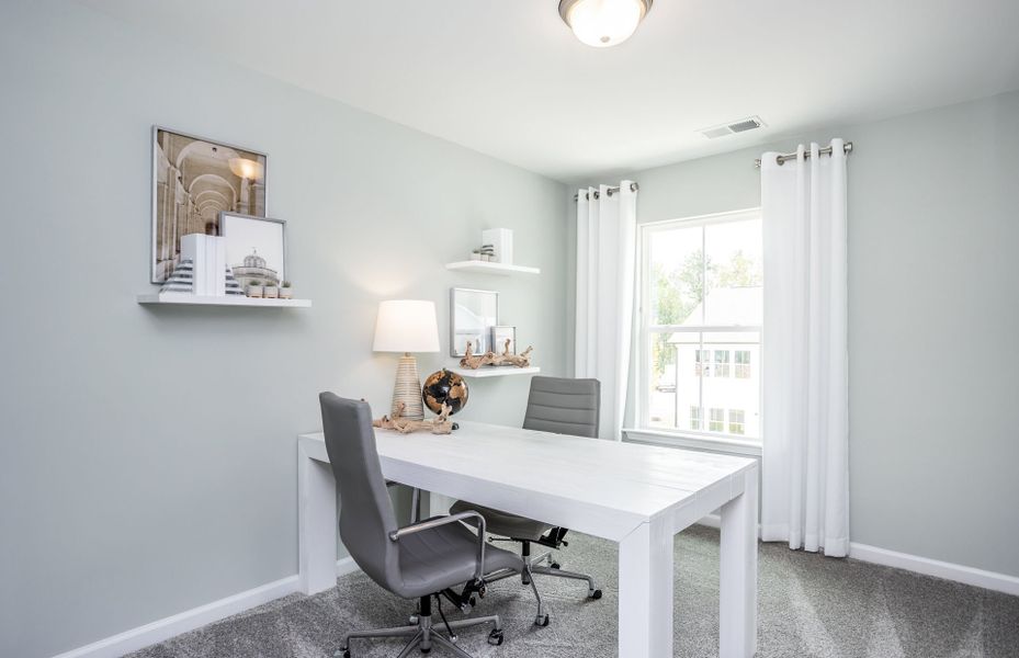 Furnished interior view inside a new home in Exchange at 401, Raleigh (Image 12).