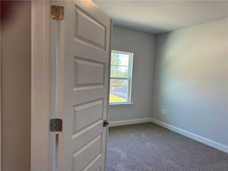 Spacious, unfurnished interior of a new home in The Fields of Walnut Creek, Pendergrass (Image 12).