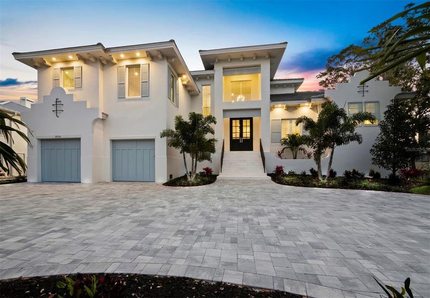 Front exterior of a new home in , Sarasota, FL, highlighting curb appeal (Image 1).