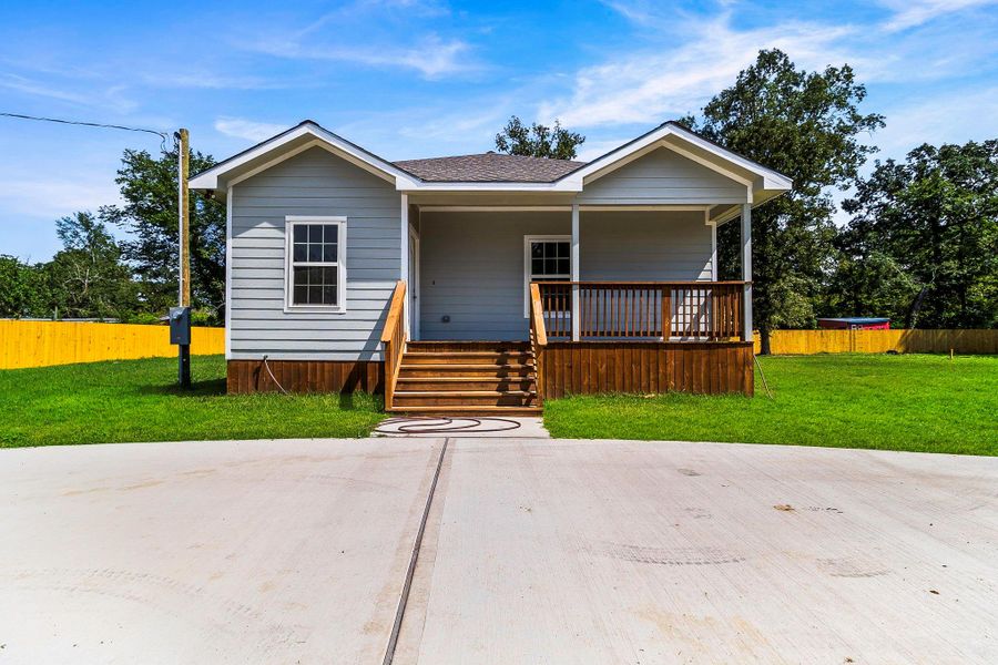 Front exterior of a new home in , Livingston, TX, highlighting curb appeal (Image 2). Front exterior of a new home in , Livingston, TX, highlighting curb appeal (Image 2).