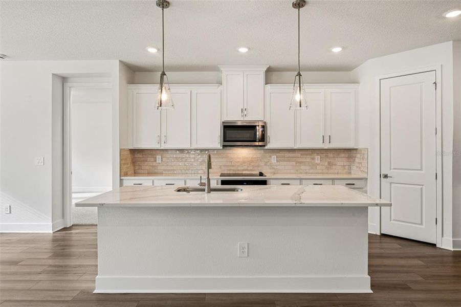Furnished interior view inside a new home in Legends Preserve - Signature Series, Daytona Beach (Image 11).