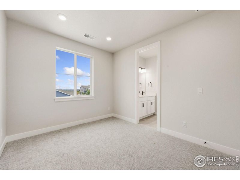 Spacious, unfurnished interior of a new home in Festival at RainDance, Windsor (Image 13).