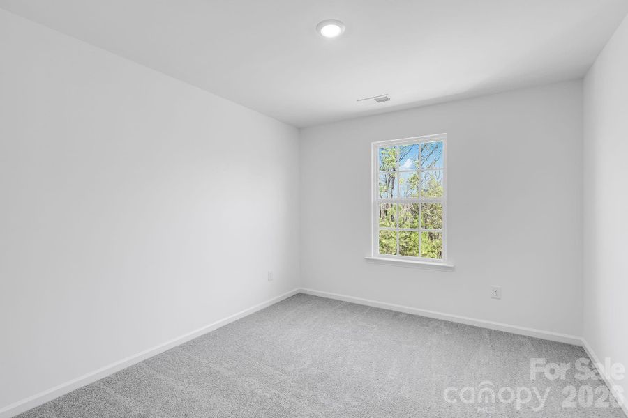 Spacious, unfurnished interior of a new home in Cannon Village, York (Image 9).