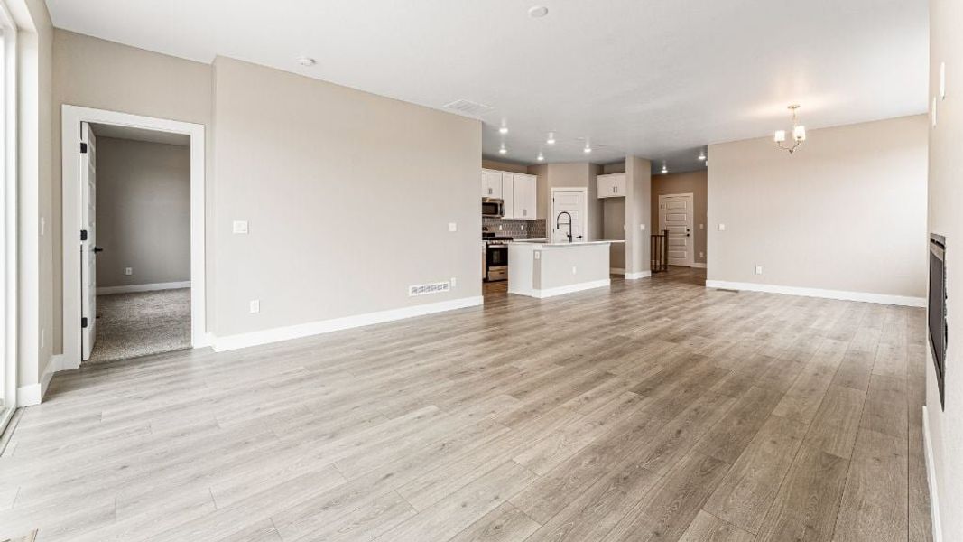 Representative unfurnished interior of a home built from the Pike by Taylor Morrison in The Aurora Highlands Town Collection, Aurora (Image 22).