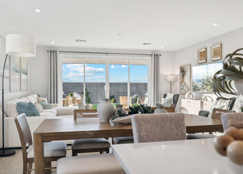 A room with a table and chairs. A room with a table and chairs.