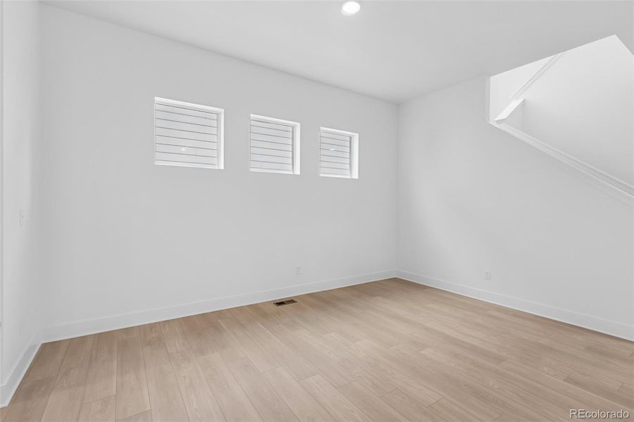 Spacious, unfurnished interior of a new home in Painted Prairie Cottage, Aurora (Image 32).