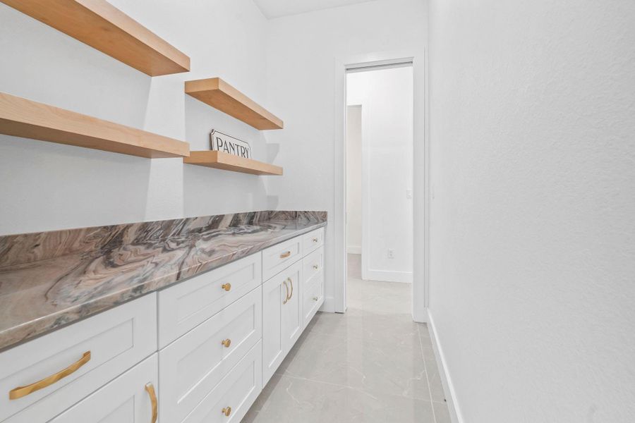 Butlers/ Pantry area behind kitchen