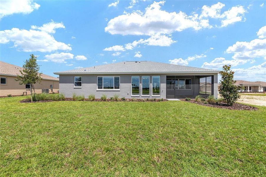 Front exterior of a new home in On Top of the World Communities, Ocala, FL, highlighting curb appeal (Image 17).