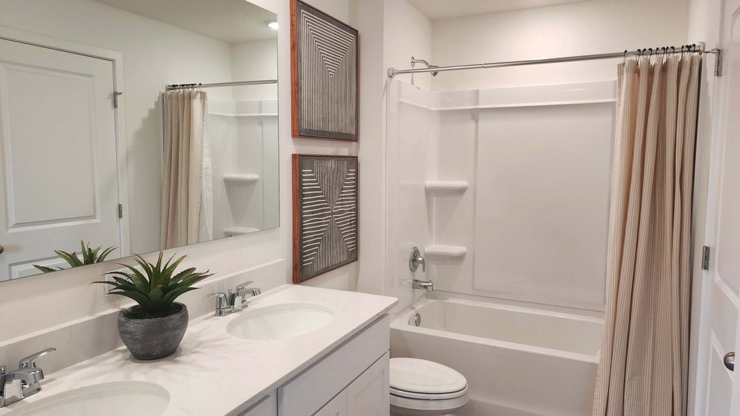 Furnished interior view inside a new home in Vineland Reserve, Osteen (Image 5).