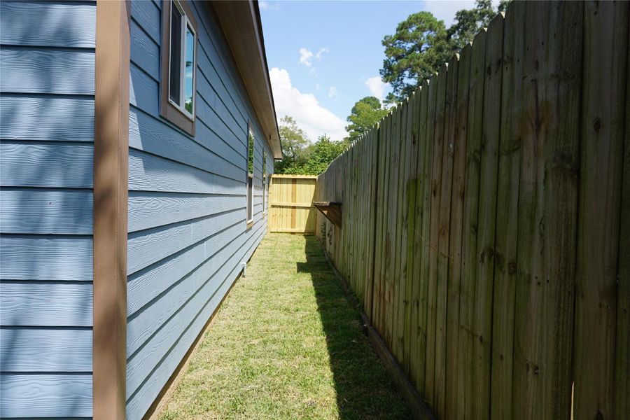 Exterior details and patio area of a home in , Willis (Image 16). Exterior details and patio area of a home in , Willis (Image 16).