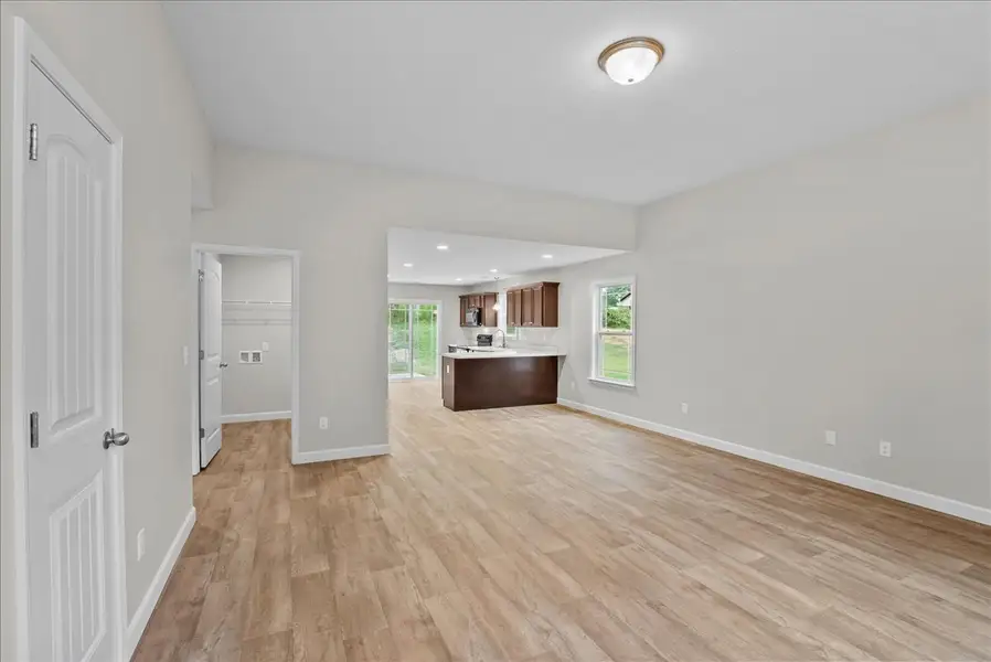 Representative unfurnished interior of a home built from the Lyman by Enchanted Homes in Lonesome Dove, San Antonio (Image 16).
