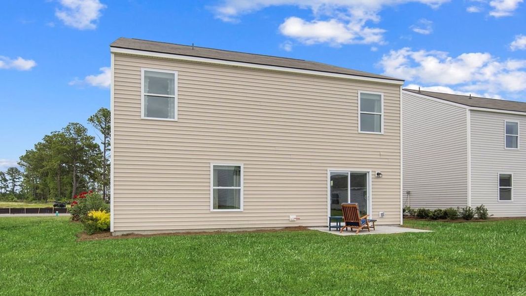 Exterior details and patio area of a home in The Lakes at North Glynn, Brunswick (Image 4).