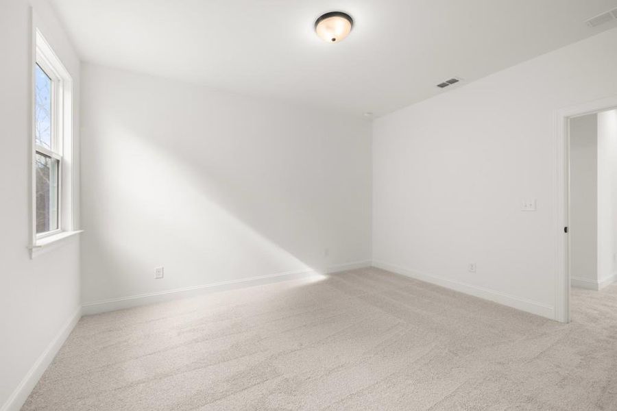 Spacious, unfurnished interior of a new home in East Harbor II at Chestatee, Dawsonville (Image 59).