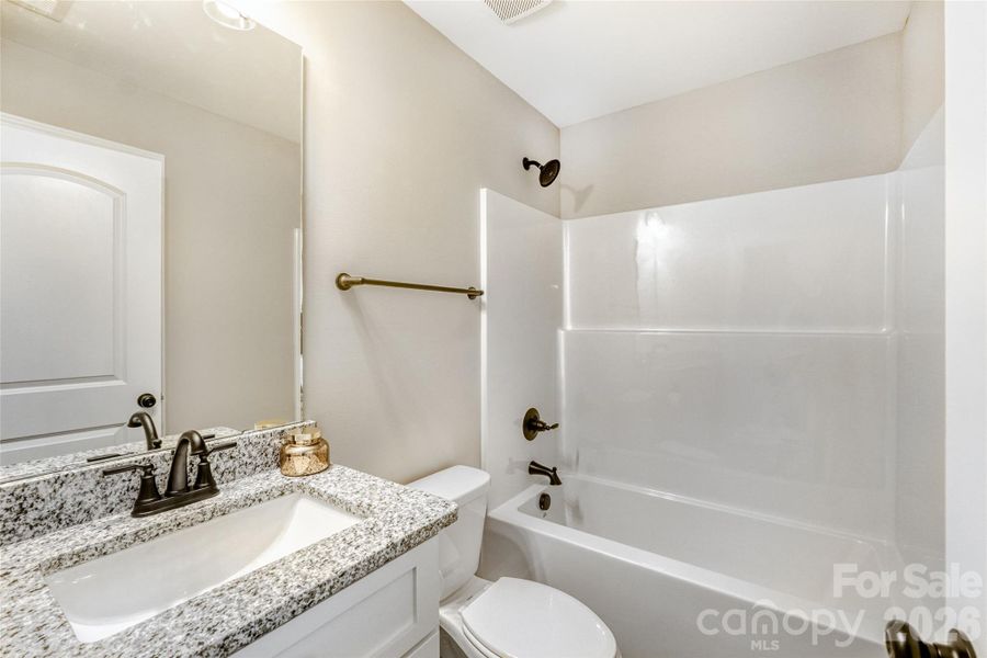 Full bath in hallway Full bath in hallway