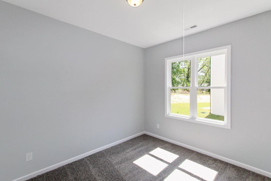 Representative unfurnished interior of a home built from the Nicklaus by RiverWILD Homes in Riverwood Ranch, Clayton (Image 24).