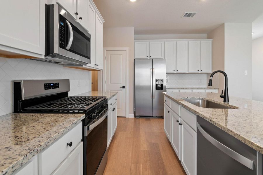 Furnished interior view inside a new home in Emberly, Beasley (Image 11).