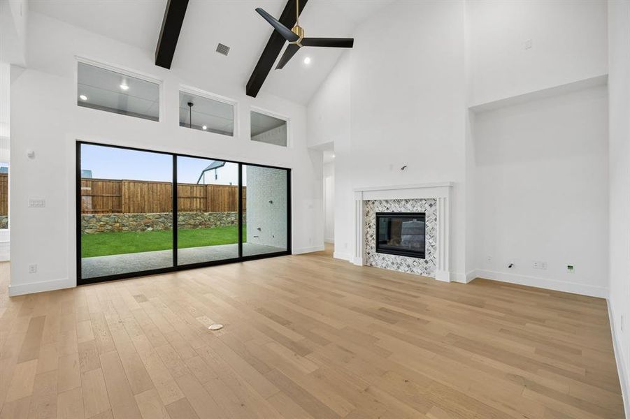 Featuring a full wall slider, it's easy to take the party outdoors in this dream home!
