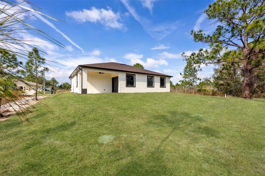 Exterior details and patio area of a home in , Lehigh Acres (Image 22).