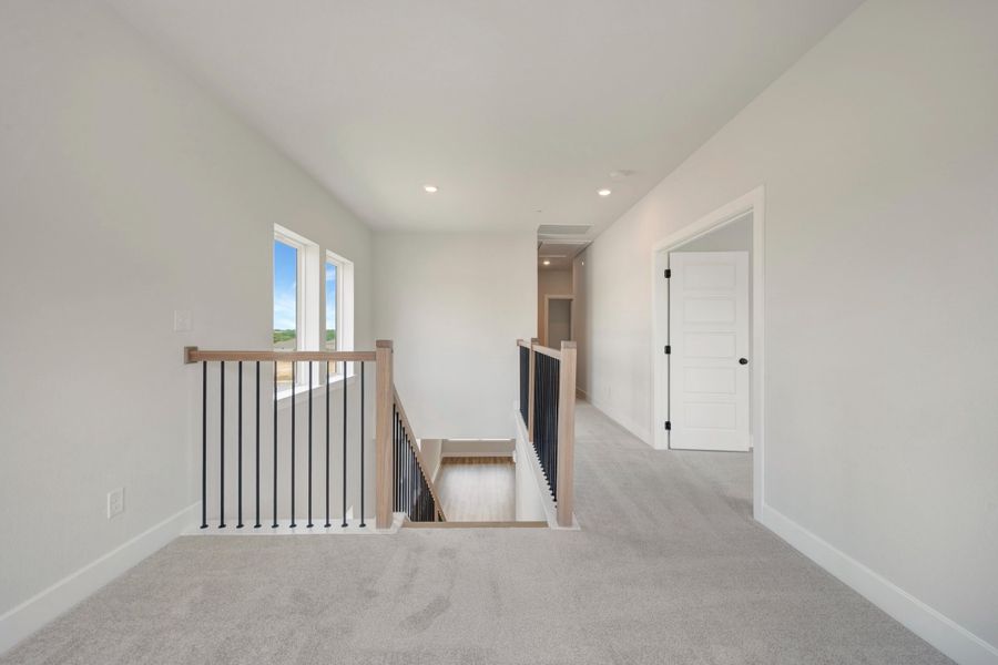 Spacious, unfurnished interior of a new home in Double Creek Crossing, Round Rock (Image 9).