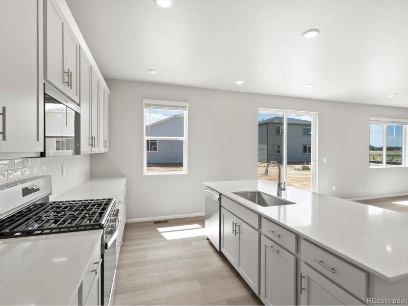 Furnished interior view inside a new home in Poudre Heights: The Alpine Collection, Windsor (Image 8).