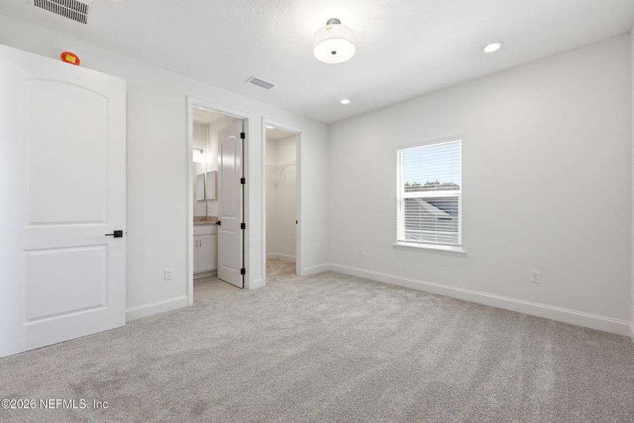 Spacious, unfurnished interior of a new home in Silver Landing At Silverleaf, St. Augustine (Image 25).