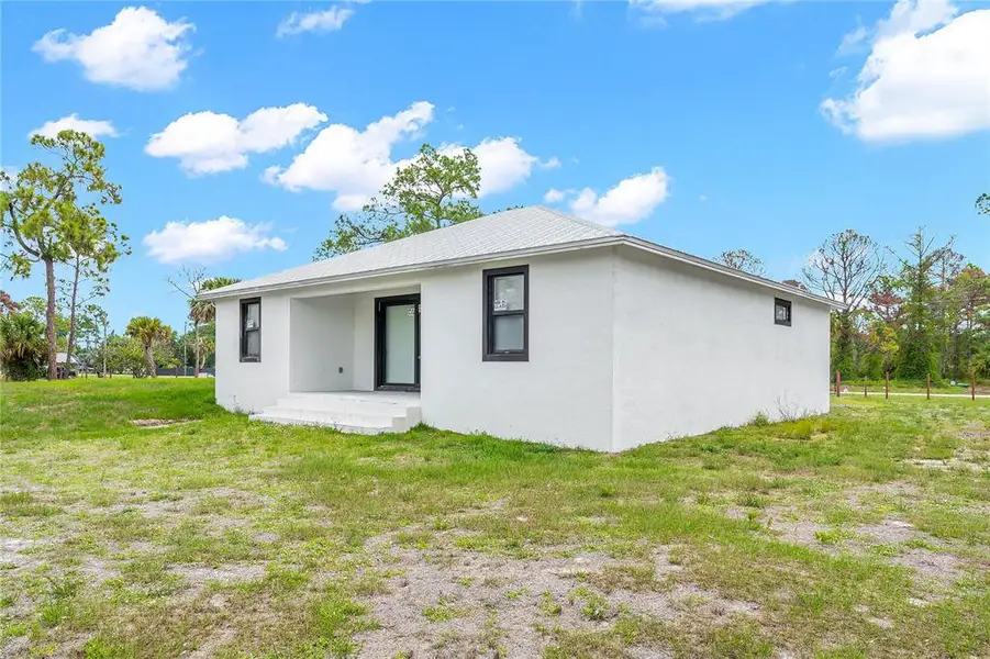 Exterior details and patio area of a home in , Clewiston (Image 29).