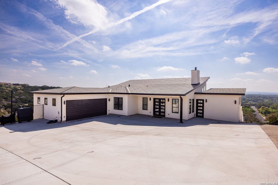 Front exterior of a new home in , Kerrville, TX, highlighting curb appeal (Image 27).