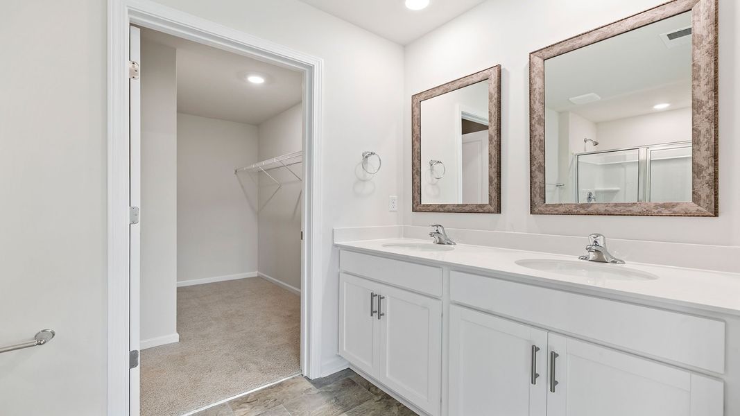 Furnished interior view inside a new home in Bentley Park, Greenwood (Image 12).