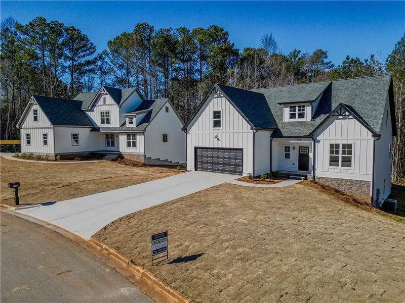Front exterior of a new home in , Villa Rica, GA, highlighting curb appeal (Image 2). Front exterior of a new home in , Villa Rica, GA, highlighting curb appeal (Image 2).