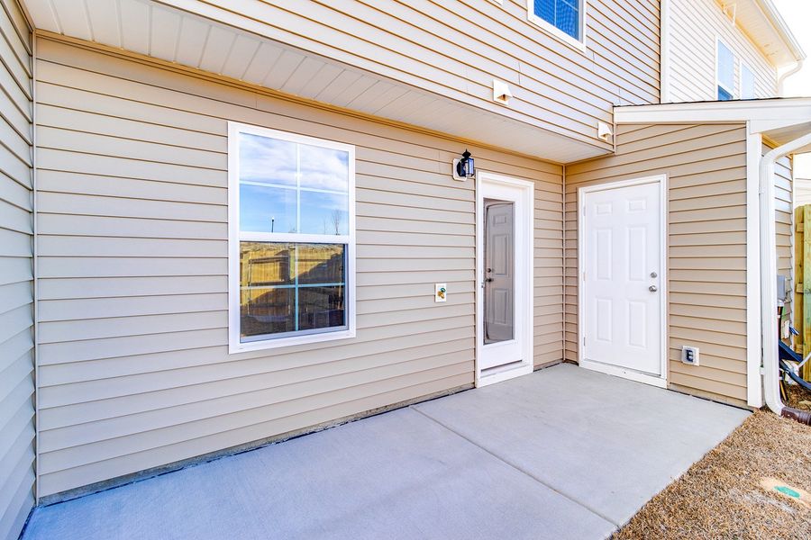 Exterior details and patio area of a home in Astoria, Columbia (Image 3).