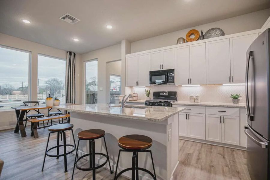 Representative furnished interior of a home built from the Pegasus by Chesmar Homes in Santa Rita Ranch, Liberty Hill (Image 4).