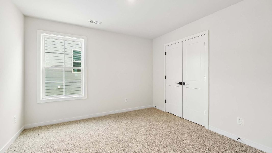 Representative unfurnished interior of a home built from the Ashley by D.R. Horton in Westport, York (Image 30).