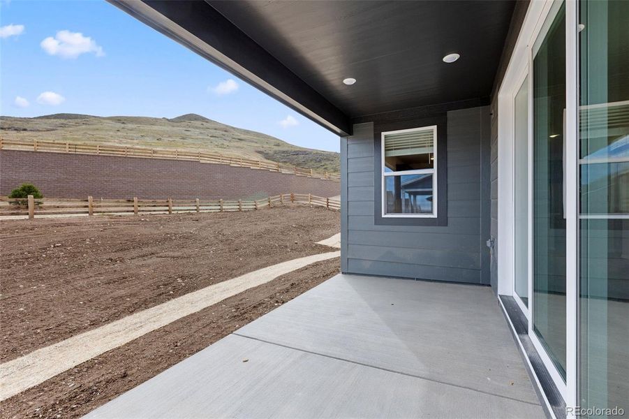 Exterior details and patio area of a home in The Manors Collection at Golden Overlook, Golden (Image 20).