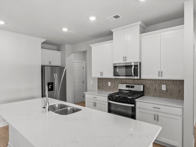 Furnished interior view inside a new home in Cedar Shoals – Heritage Collection, Piedmont (Image 4).